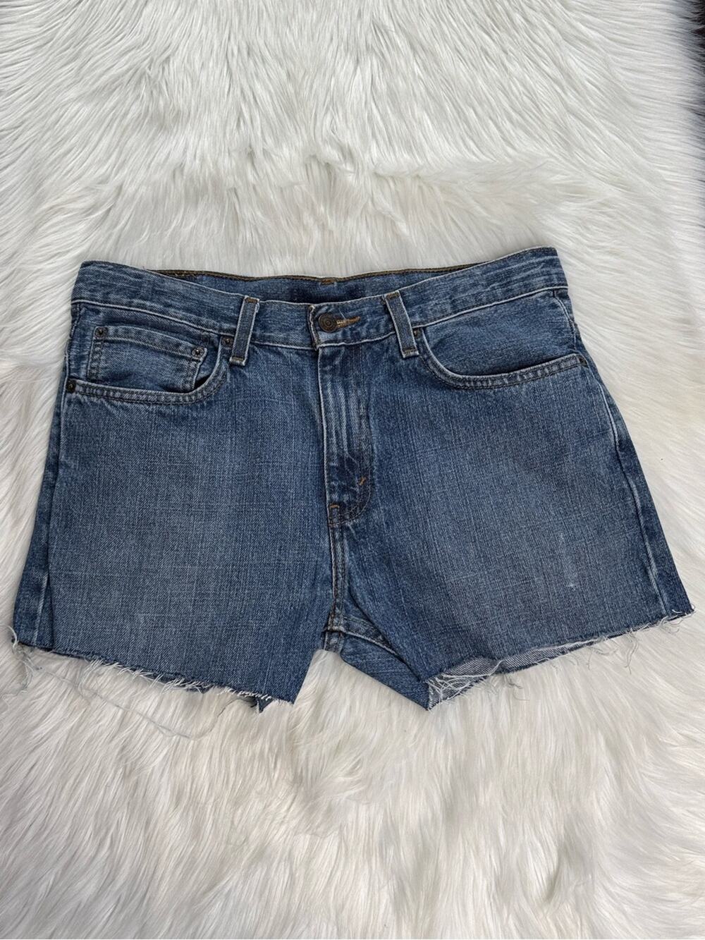 Levi’s Faded Blue Denim High Rise Cut Offs
